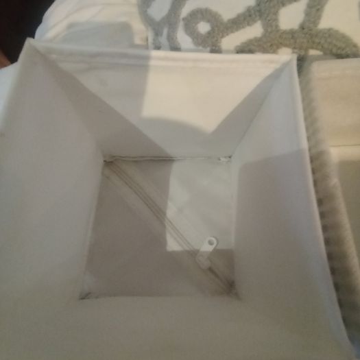 2 small foldable storage boxes