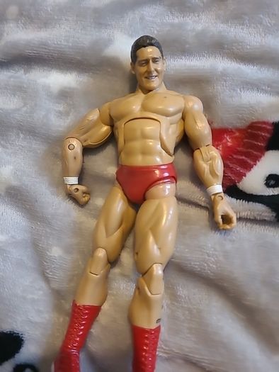 13 WWE wrestling figures