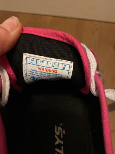 heely pink shoe with wheels