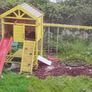 Garden playhouse with slide, swings, look out tower, picnic table Image 2