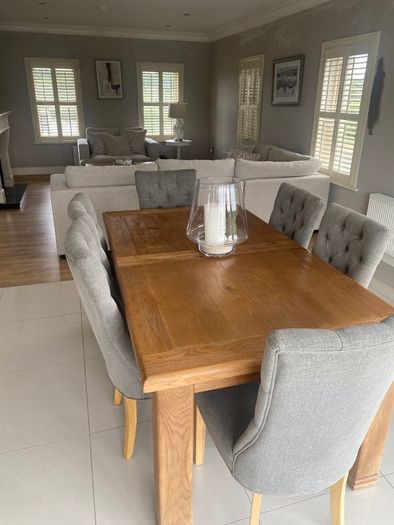 Solid oak dining table and chairs