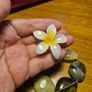 Modern Green Bracelet with a White Flowery Clip Image 3