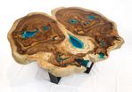 Round live edge coffee table glowing in the dark