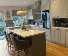 5 piece alderly light grey kitchen doors with chrome handles & dark grey island