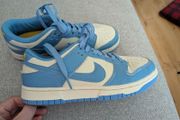 2 pairs Nike trainers, size 5