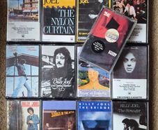Billy Joel tape collection x 13 & plastic case.