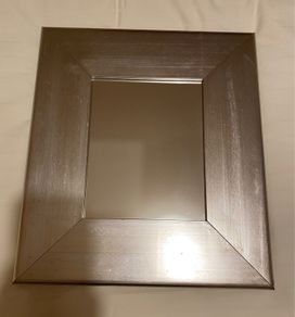 Rectangular mirror with silver border