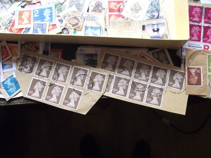 A box with collection of stamps from Great Britain