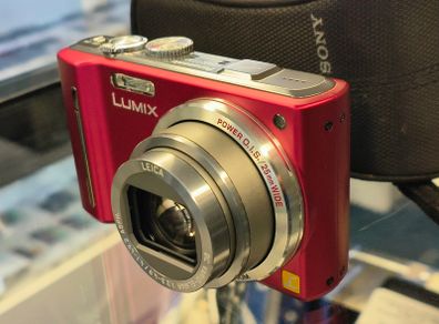 Panasonic LUMIX DMC-TZ10 12.1MP Digital Camera 12x Optical Zoom Red/ Excellent