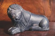 Antique carved Winking Lion
