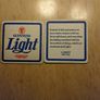 Guinness Light pint glass and beer mats Image 5