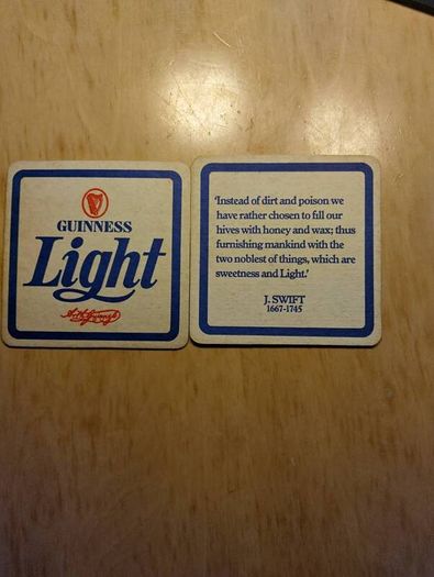Guinness Light pint glass and beer mats