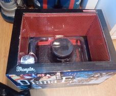 Diana F+ Wrangler Camera in box with book with film