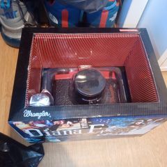 Diana F+ Wrangler Camera in box with book with film