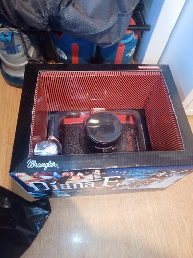 Diana F+ Wrangler Camera in box with book with film