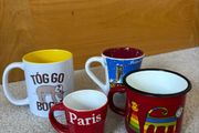 A collection 4 random Cups/ mugs