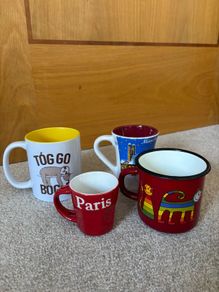A collection 4 random Cups/ mugs