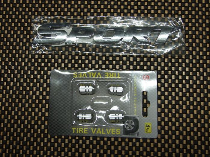 Sports badge and valve caps