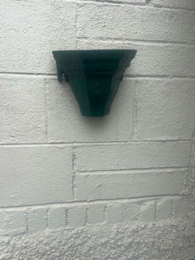 3 water hoppers converted to plant holders. With drainage