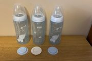 Various Nuk first choice bottle sets