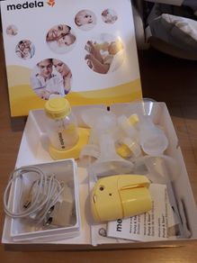 Electric breast pump