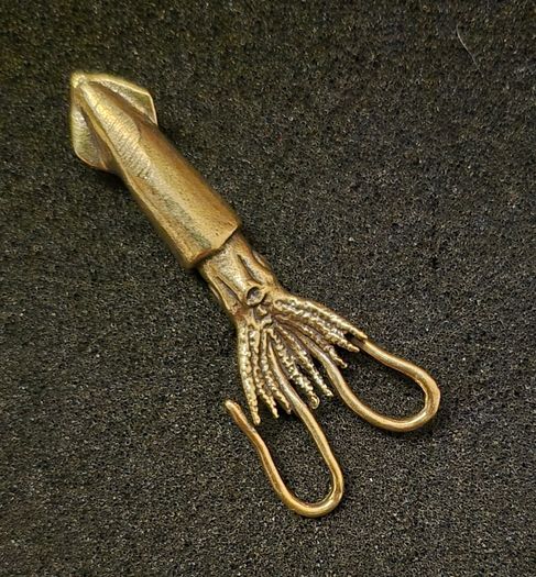 3 brass fish.