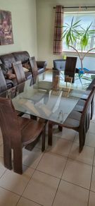 Solid Glass Topped Oak Table With 8 Oak Chairs