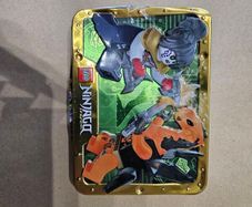 lego ninjago minifigures + tin