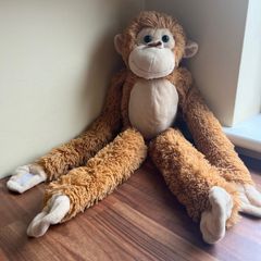 Light brown cheeky hanging Monkey