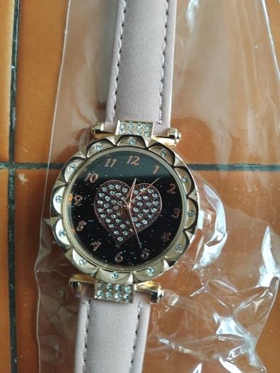 2 womens watches with leather straps