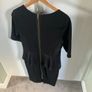 River Island black peplum dress with gold zip Image 2