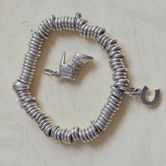 Links of London Sweetie bracelet, sterling silver 925, with lovely charms. In good pre-owned condition.