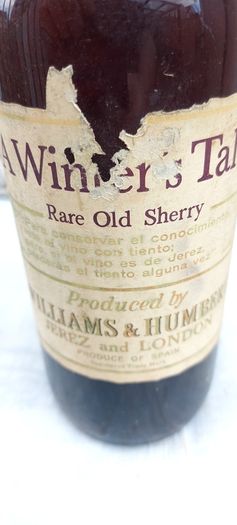 vintage bottle of winters tale sherry 3/4 full ,found in a old pub closed down,