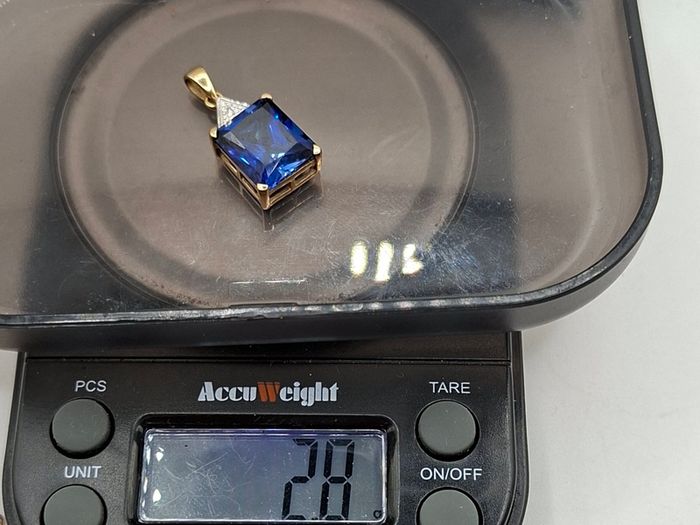 9ct blue sapphire diamond pendant
