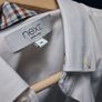 Mans white shirt... Image 9
