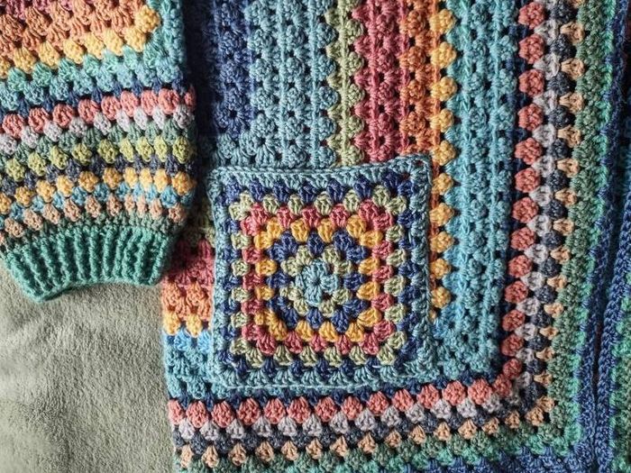 Crocheted colourful hexagon jacket