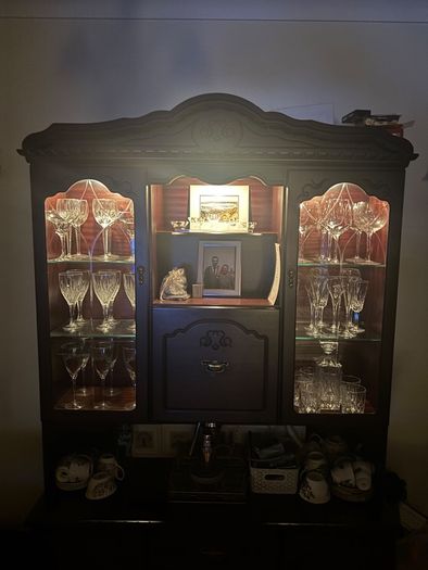 Dark wood antique china cabinet
