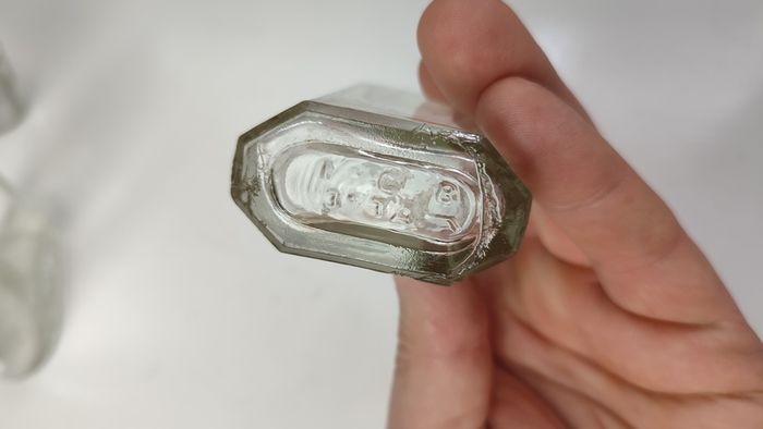 294 - Set of 7 Vintage Clear Glass Decorative Collectible Display Household Bottles