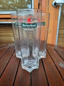 Brand new Heineken pints glasses