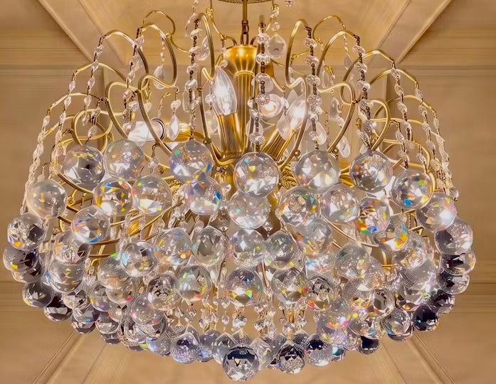 There is about 80 Crystal balls on this chandelier.