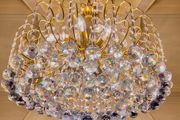 There is about 80 Crystal balls on this chandelier.