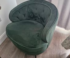 Green velvet tub chair