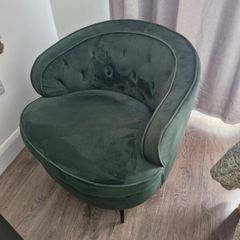 Green velvet tub chair
