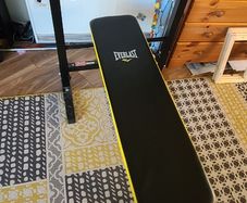 Weight bench with adjustable barbell rack