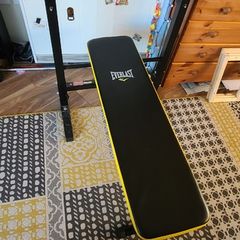 Weight bench with adjustable barbell rack