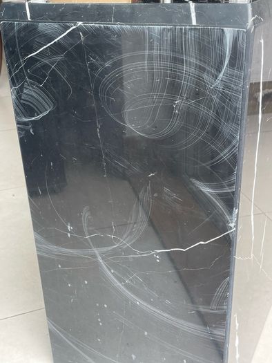 Glass table top and marble base