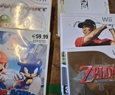 wii games 6 including zelda Mario and sonic and Mario cart