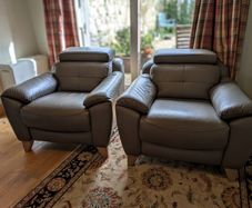 2 leather Parker Knoll armchairs