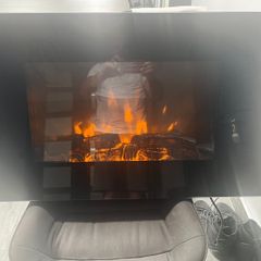 Wall mounted electric fire