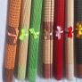 Ten Multicoloured woven bamboo placemats. Image 3